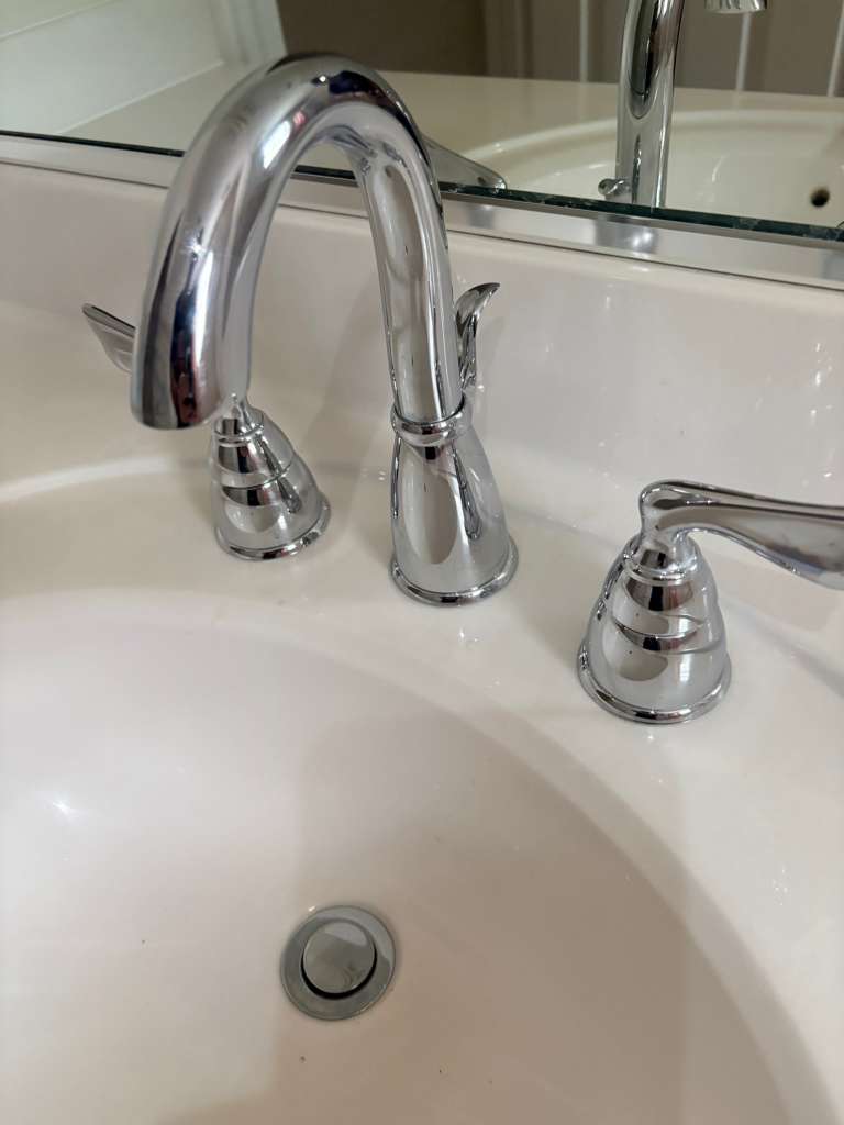 Chrome widespread bathroom faucet installation