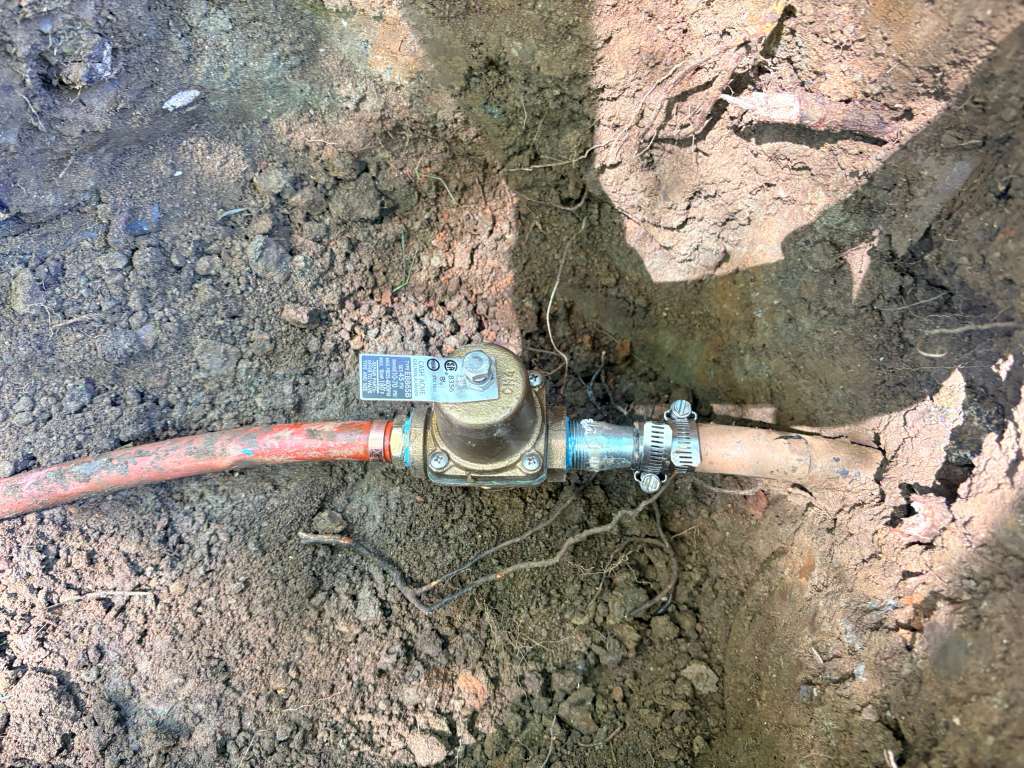 Pressure regulator replacement on buried water line